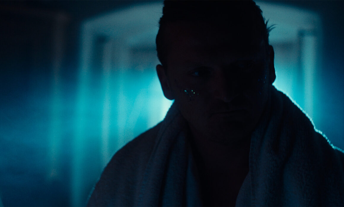 Still from the movie "Fuel" showing actor Marcel Wolski in a dark silhouette.
